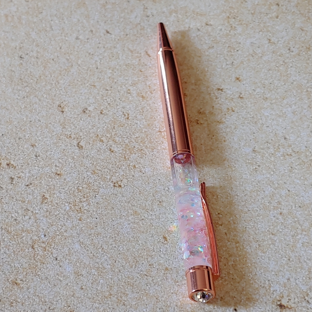 Gold with pink confetti pen